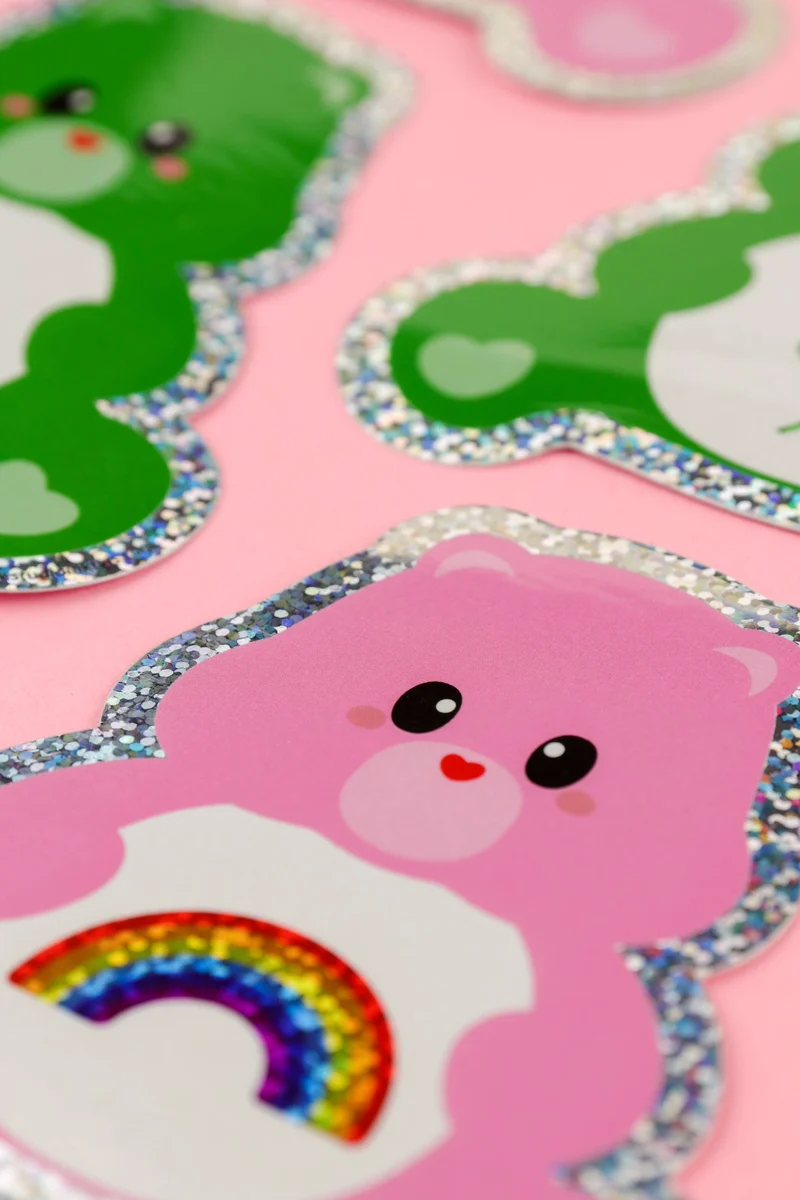 Autocollant pailleté Care Bear avec arc-en-ciel